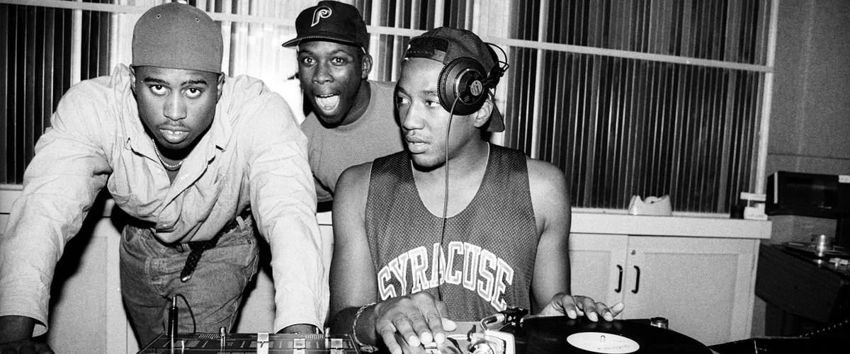 Q-Tip DJ'ing with his fellow A Tribe Called Quest group members