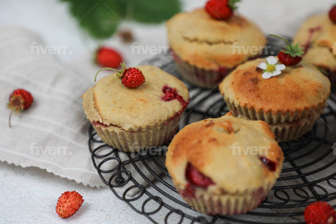 A picture of Strawberry muffins with strawberries 