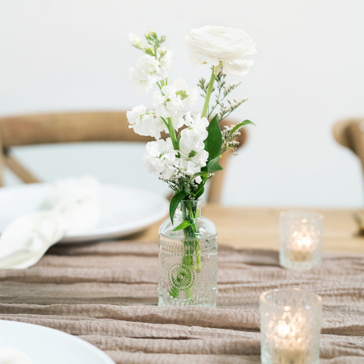 How to make bud vase centerpieces look fuller? : r/Weddingsunder10k