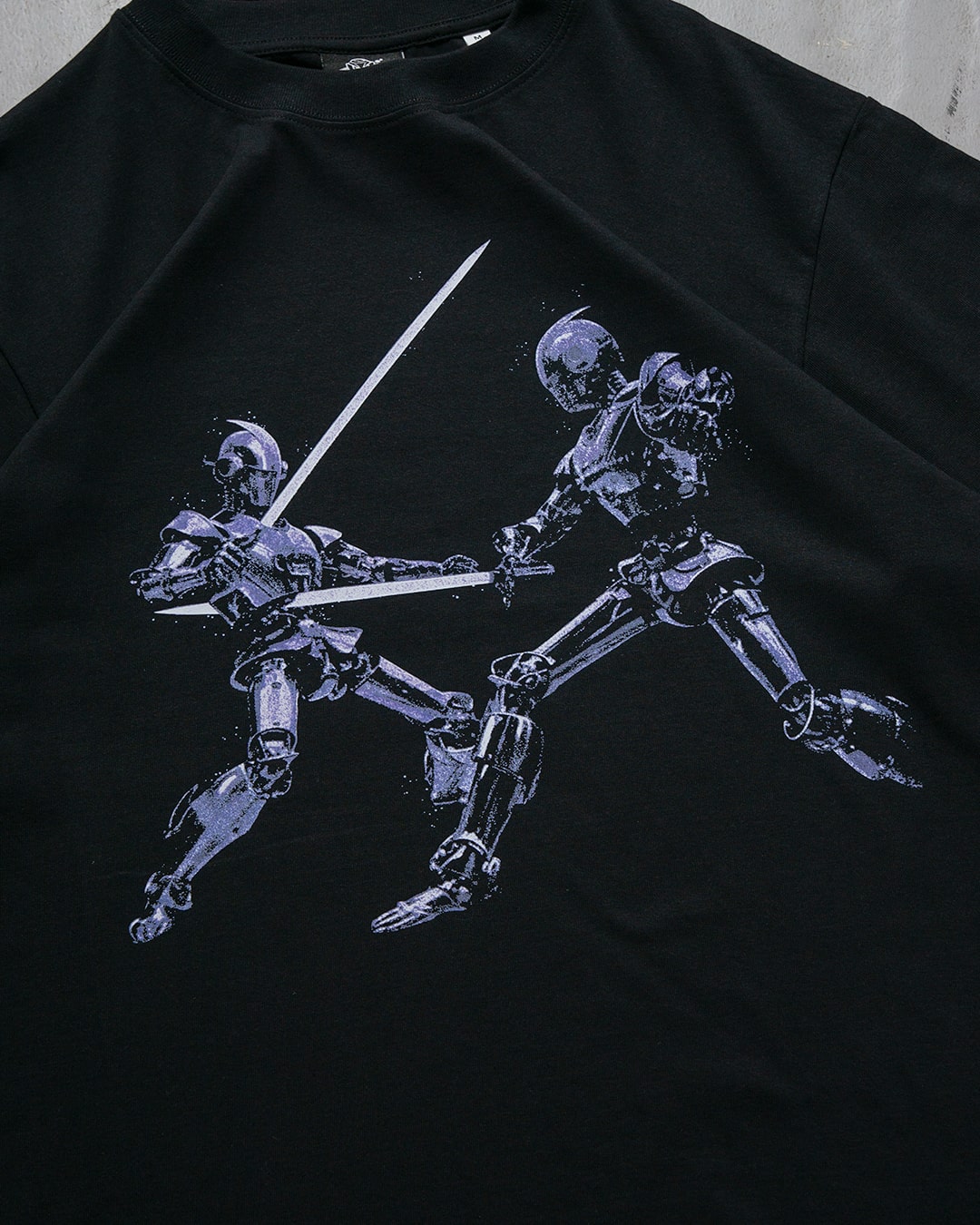 Mechanical_Duel_Tees_close-min