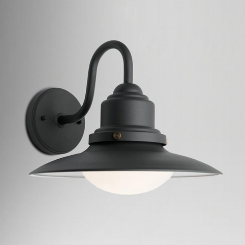 Black steel wall light with curved arm and black shade and opal shallow glass bulb