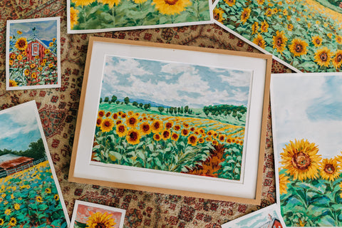 Sunflower paintings grouped together.