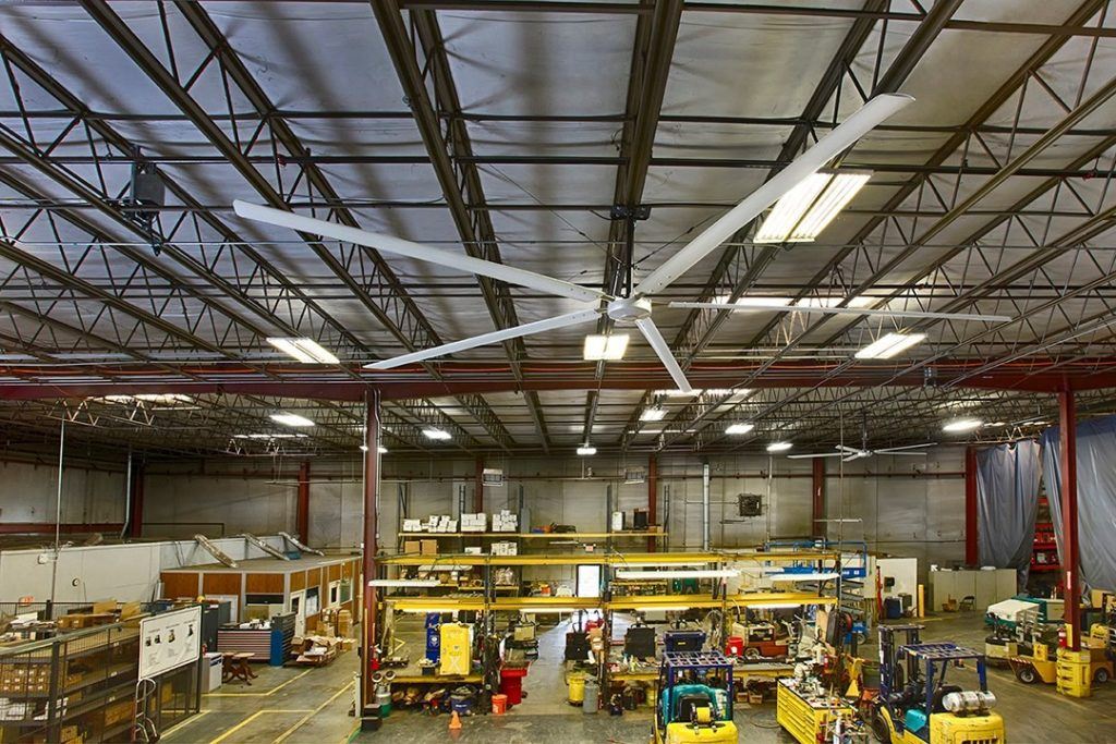 A picture containing warehouse with Hunter Industrial Titan series