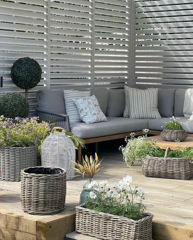 patio decking and rattan planters 
