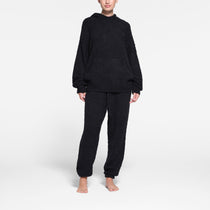 Skims Black Cozy Knit Zip-up Hoodie In Onyx