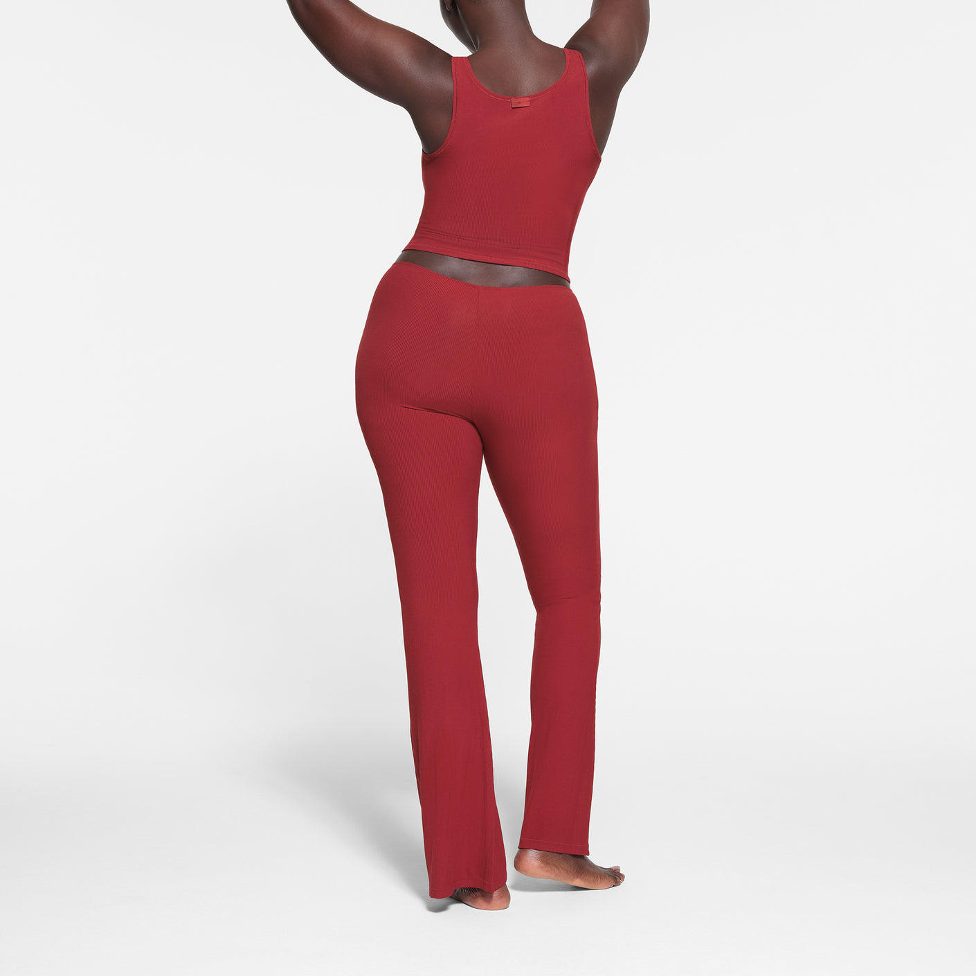 Skims Soft Lounge High-rise Wide-leg Stretch-jersey Trousers in Red