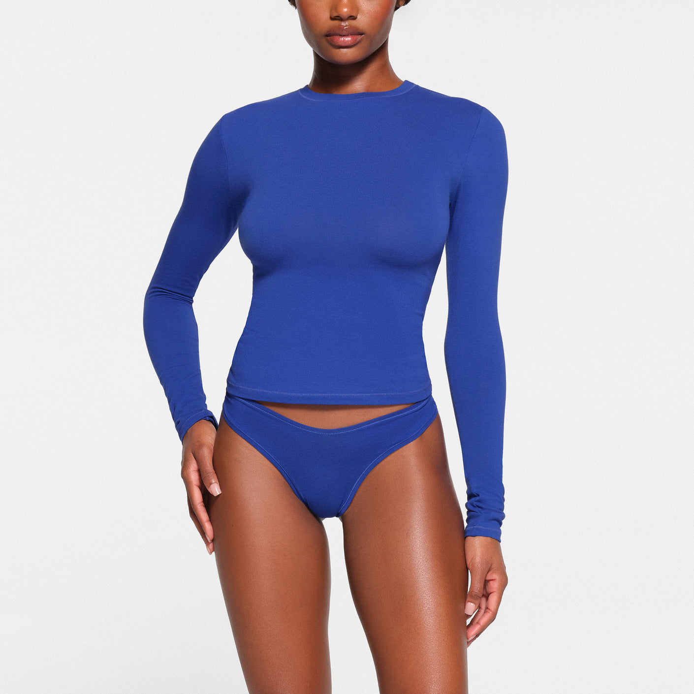 SKIMS - The soft and stretchy Cotton Jersey Mock Neck Tank, Dipped Front  Thong and Muscle Bodysuit in Soot — available now in sizes XXS - 4X. Shop  the Cotton Collection