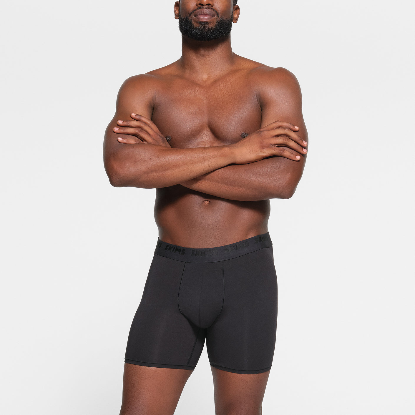 skims Men's Try on in the Cotton Briefs in Mutli color pack, on a size 3x  body.