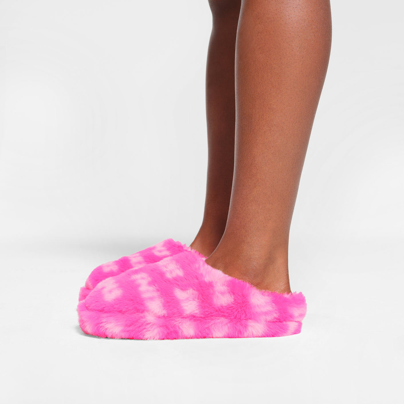 VALENTINE'S LOGO SLIPPER | BABY PINK/PINK ON A MODEL SIDE VIEW