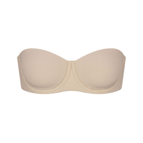 SKIMS on X: The Mesh Strapless Bra is the ideal strapless styling solution  featuring fully convertible, detachable straps that allow for strapless,  racer back, halter, one shoulder and wide strap options. Available
