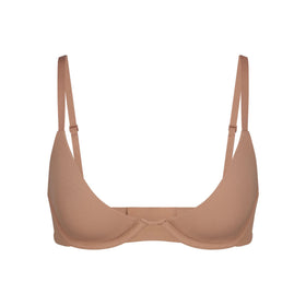 I'm a 34DDD and did a Skims bra haul – I feel 'jiggly' in the scoop style &  the plunge's giving a whole lot of cleavage