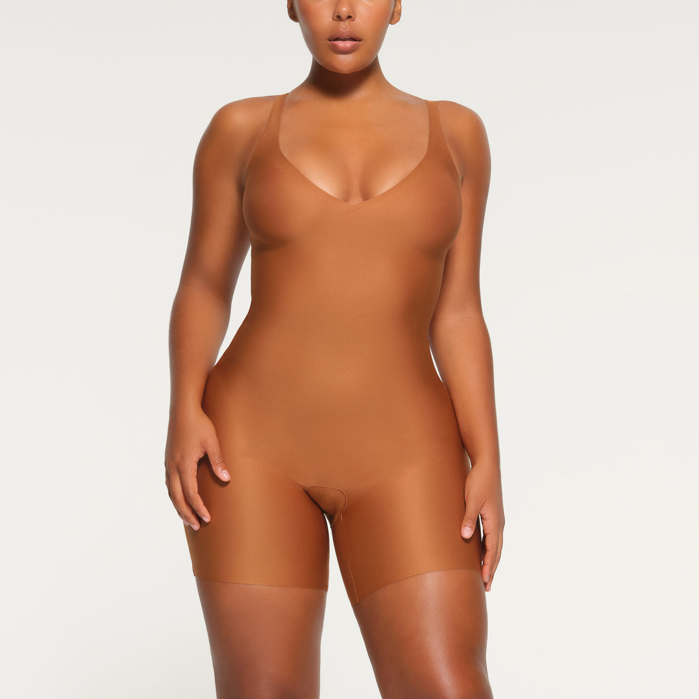 SKIMS BODY UNLINED PLUNGE MID THIGH BODYSUIT