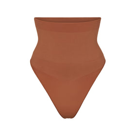 Track Naked Shine Thong - Clay - XXS at Skims - TrackaLacker