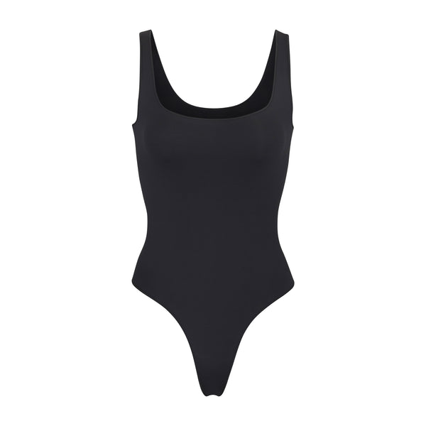 SKIMS Skims Wet Jersey Cutout Bodysuit In Ochre XS