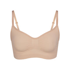 SKIMS on X: The T-Shirt Bra ($52) - extra comfort and support with lightly  molded cups that enhance your natural shape. Available now in 9 colors and  28 band and cup sizes.
