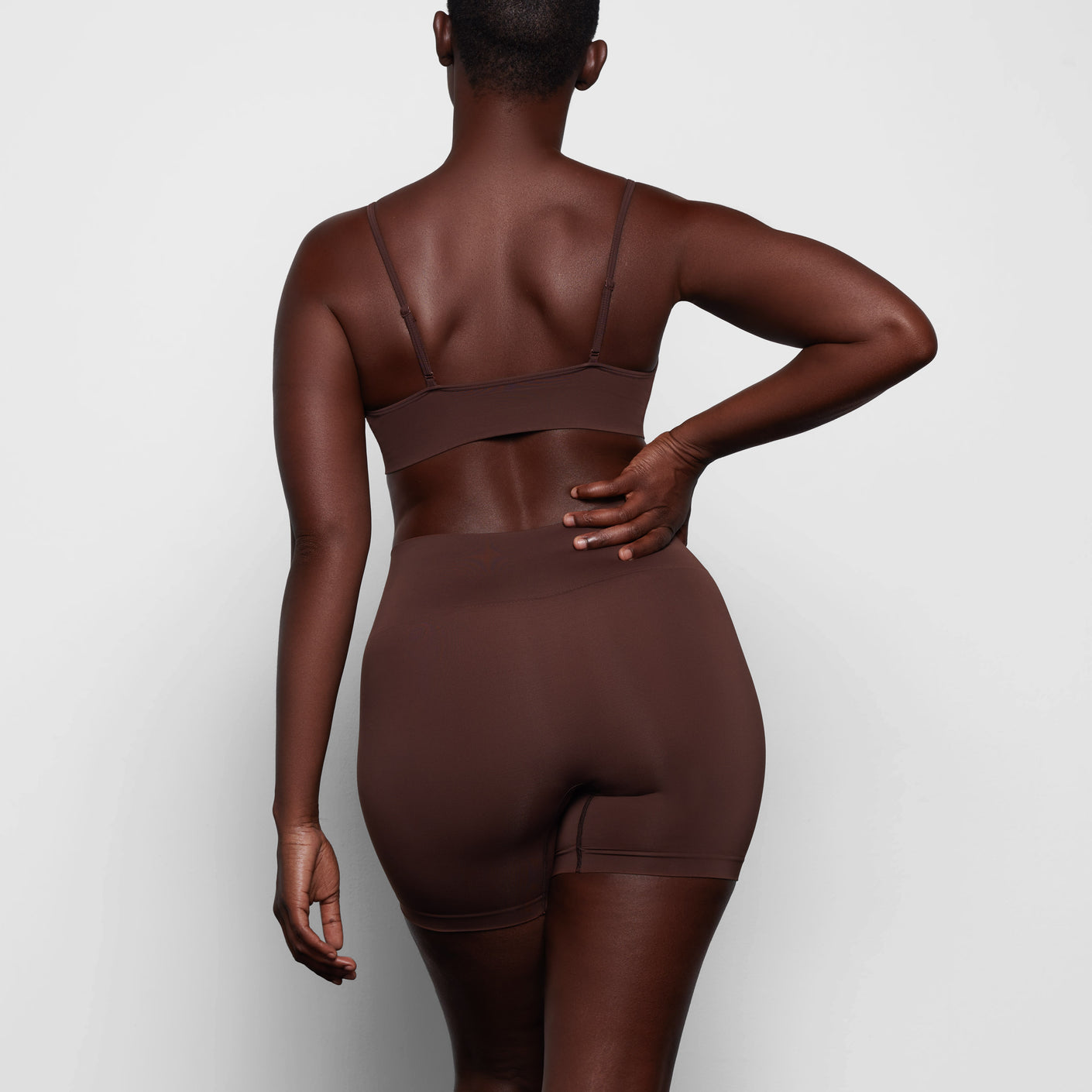 SKIMS, Tops, Skims Soft Smoothing Thong Bodysuit Cocoa Never Worn Nwt  Small