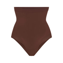 SKIMS Seamless Sculpt Strapless Thong Bodysuit - Cocoa - ShopStyle Shapewear