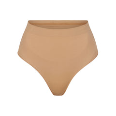 Buy SKIMS Sculpting Seamless Mid Thigh Bodysuit - Ochre At 50% Off