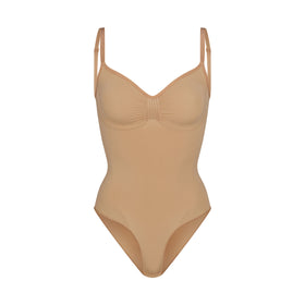 SKIMS Sculpting Bodysuit NWOT Tan Size XS - $38 (49% Off Retail) - From  Bailey