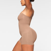 Skims Seamless Sculpt Strapless Shortie Bodysuit in Natural