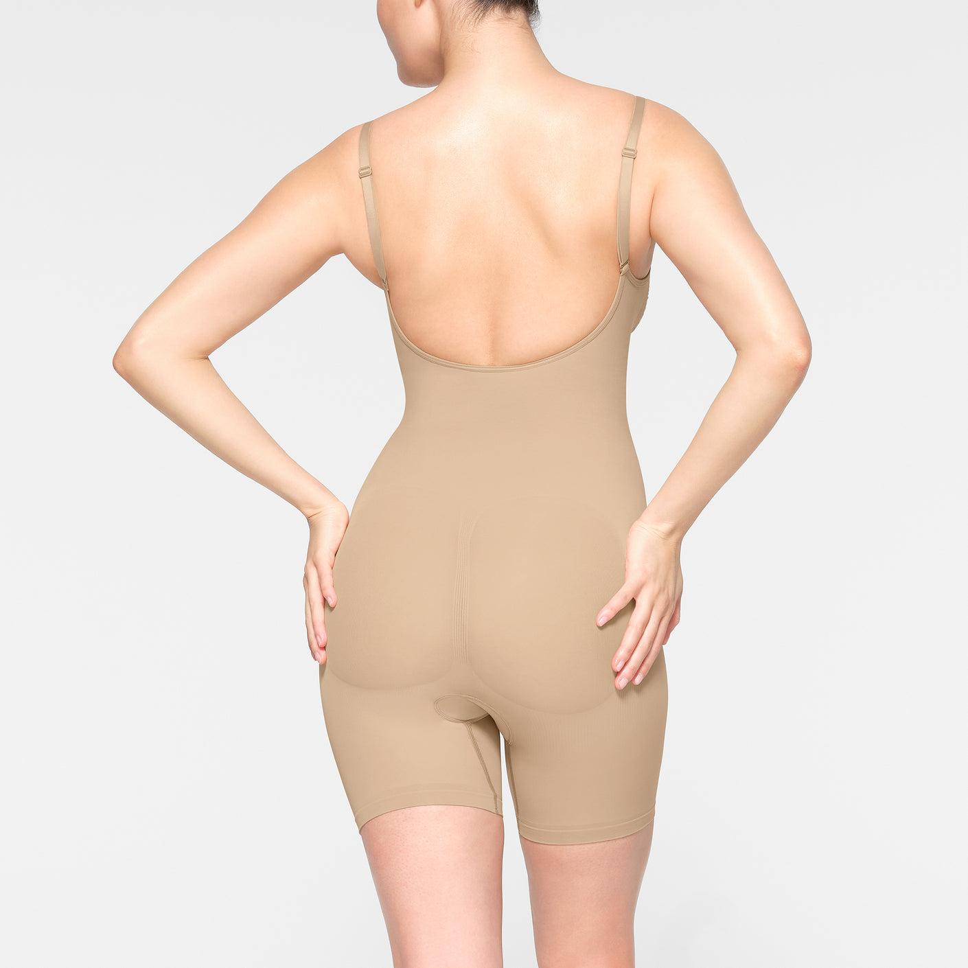SEAMLESS SCULPT LOW BACK MID THIGH BODYSUIT | CLAY