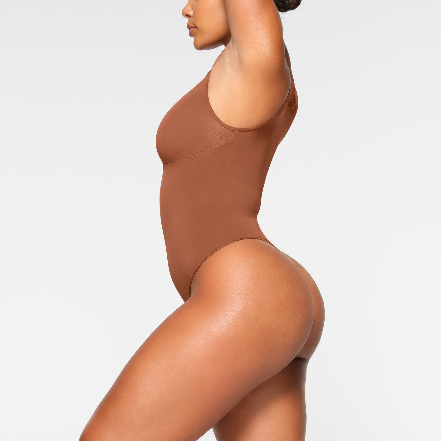 Buy SKIMS Brown Seamless Sculpt Scoop Neck Thong Bodysuit for Women in  Kuwait