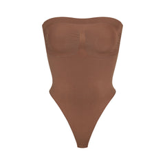 SKIMS - The Core Control Thong ($24) in Sand. Shop now in select sizes and  colors at SKIMS.COM and enjoy free domestic shipping on orders over $75.  Photo: #VanessaBeecroft