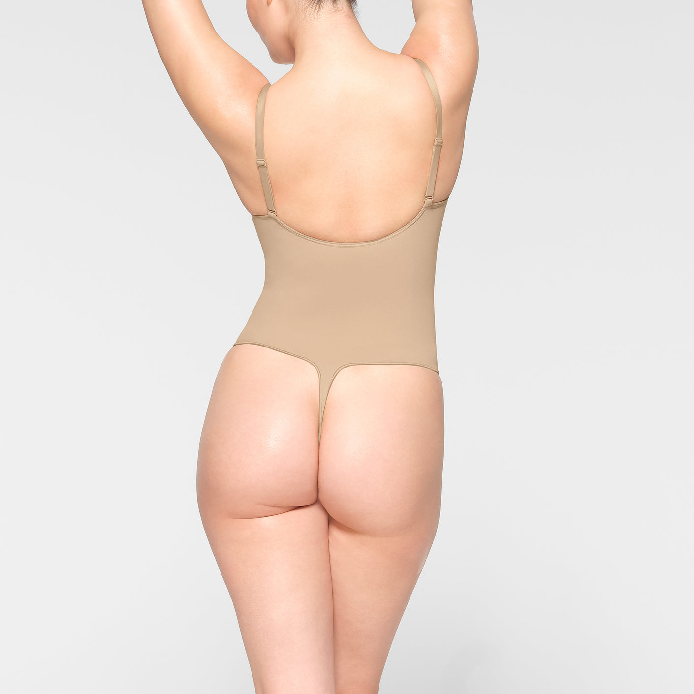 SEAMLESS SCULPT LOW BACK THONG BODYSUIT | SAND