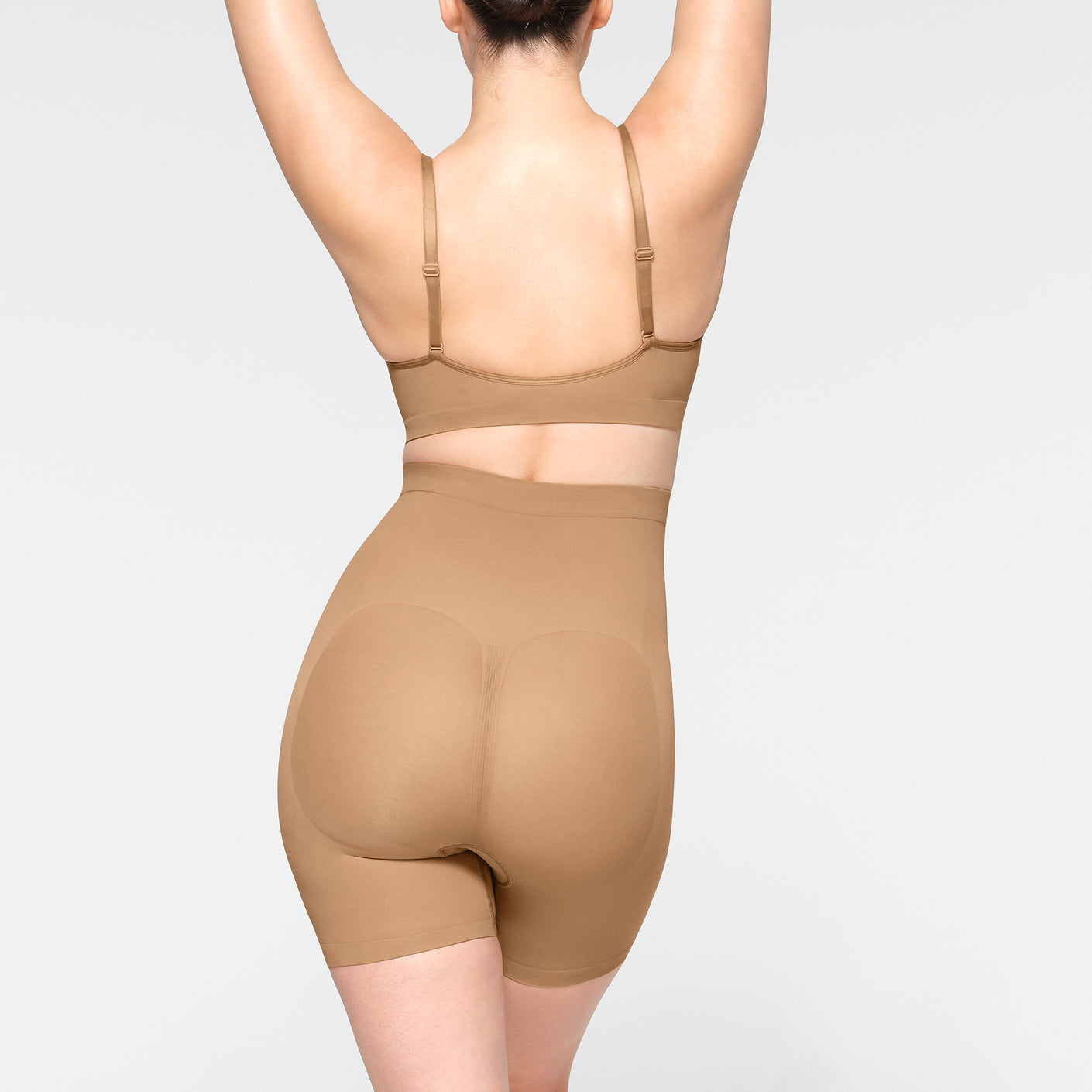 Skims Seamless Sculpt Strapless Shorts Bodysuit In Ochre