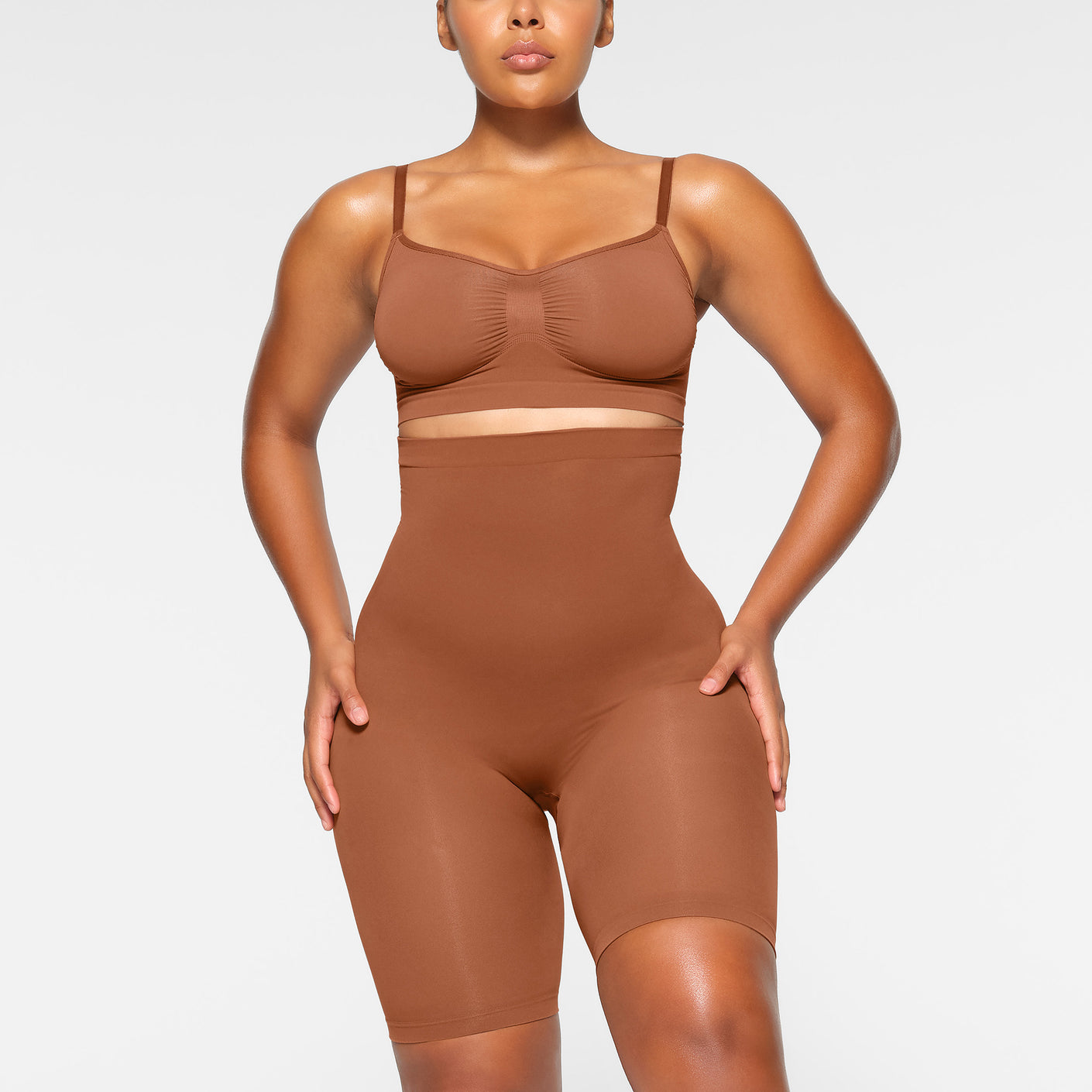 SEAMLESS SCULPT HIGH-WAISTED ABOVE THE KNEE SHORT | BRONZE