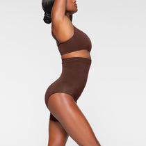 Patents on the soles of your shoes: Oh, patents! SKIMS™ Shapewear  Solution Shorts