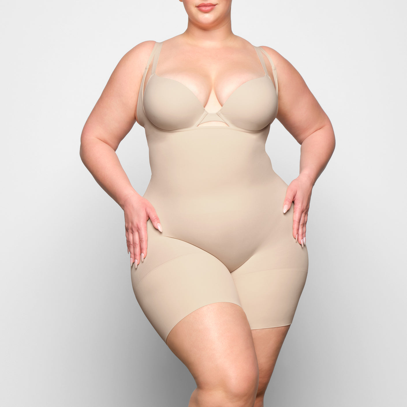 BUTT ENHANCING OPEN BUST BODYSUIT | SAND