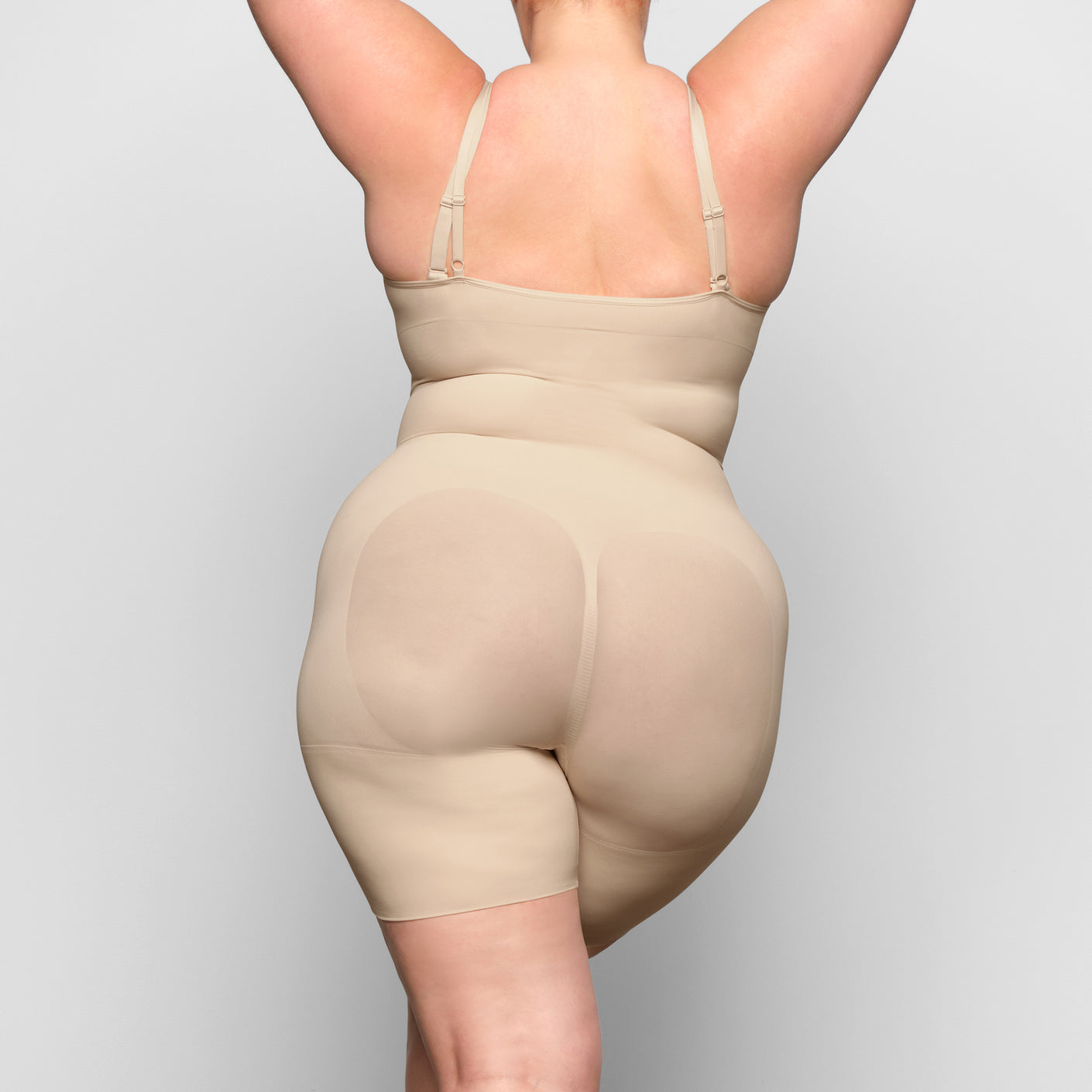 You guys need this @SKIMS butt- enhancing open bust shapewear droppin