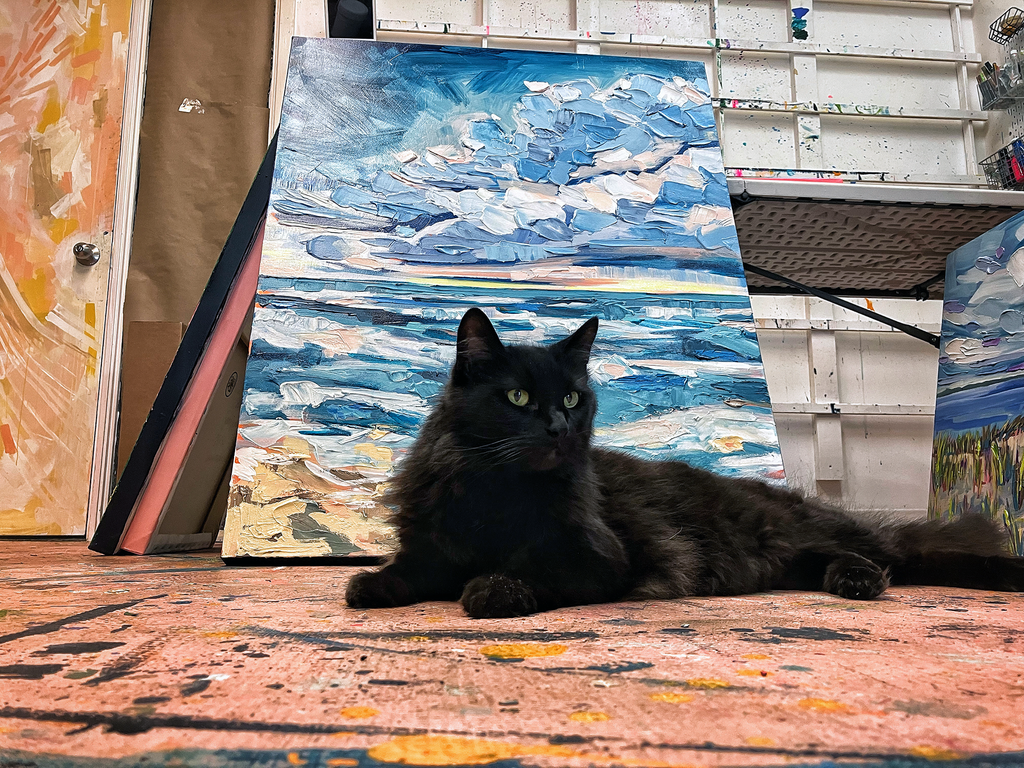 Looey in front of a painting