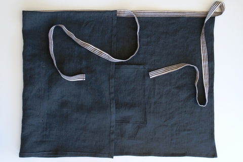 flat lay of the final apron all stitched and finished