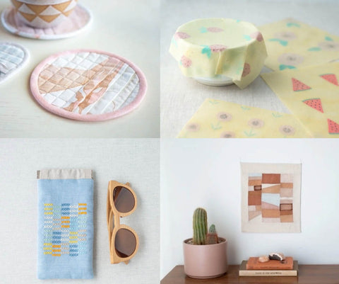 a collection of four images. the top left is a circular coaster on a white table. It has a pink edge and delicate pink abstract pattern on the fabric. It has been quilted in a grid to give texture. the top right is a beeswax wrap in a pale yellow with small water melon patterns on it. The wrap is moulded over a bowl. the bottom left is an abstract picture made up in ochre colours. it has been placed over a desk and on the desk there is a cactus is a pale pink pot and two books stacked next to it. the bottom left image is a glasses case with cross stick embroidery on it. It isn't a picture of anything just crosses in a grid in blocks of yellow, blue and pink and white. a pair of wooden framed sunglasses lie next to it. 