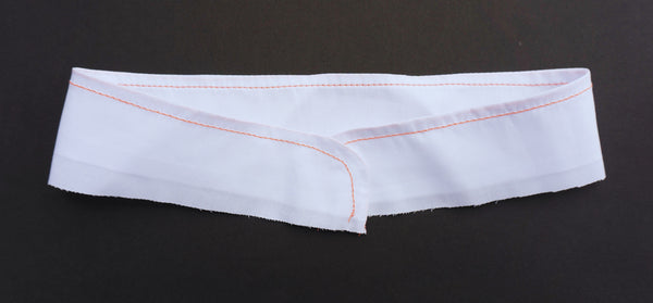 picture of a standing straight collar with orange coloured stitching