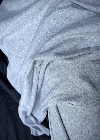 a close up of crumpled grey terry showing the texture