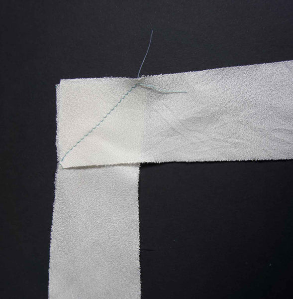 two pieces of fabric joined at 45degree angle