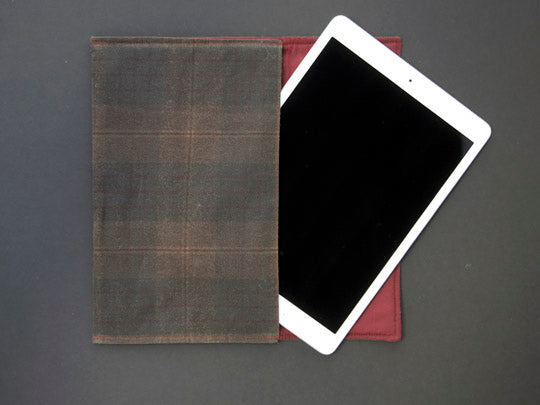 An image of the tablet cover with the iPad coming out of the cover