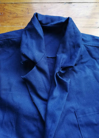 a photo of a botched notched collar. The notch of the collar is all rumpled and will not sit straight for the photo. or in real life. 