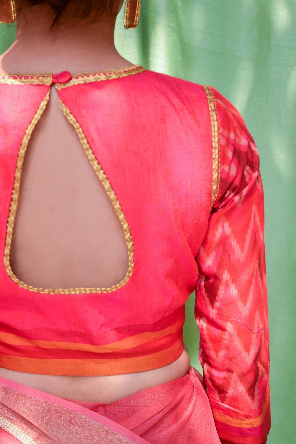 Reddish pink raw silk closed neck blouse with Ikat sleeves – House of ...