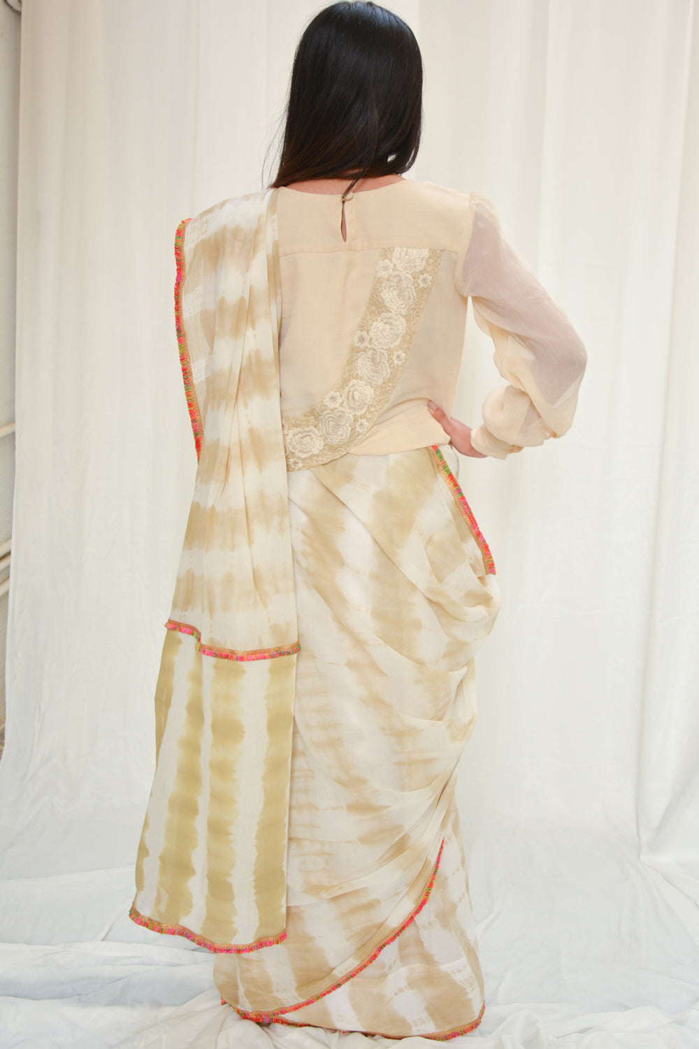 Off white and yellow stripes cotton saree with gold lace border