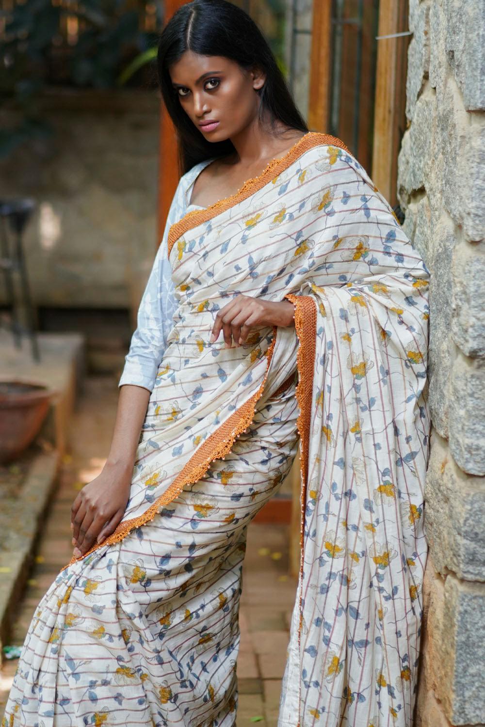 Off white and mustard floral muslin cotton saree with crochet border ...