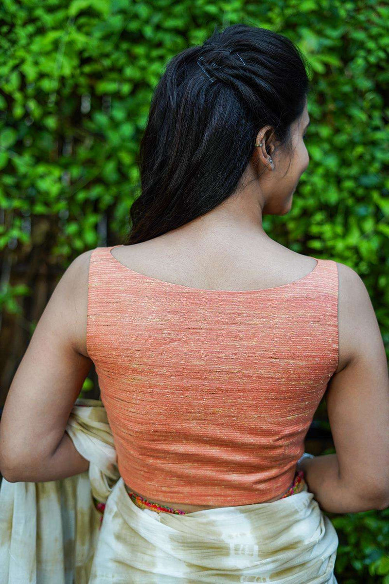 Apricot orange jute tussar boatneck sleeveless blouse with cut out at ...
