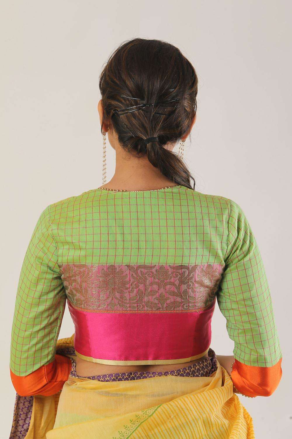 Green chiffon blouse with brocade detailing and sheer sleeves