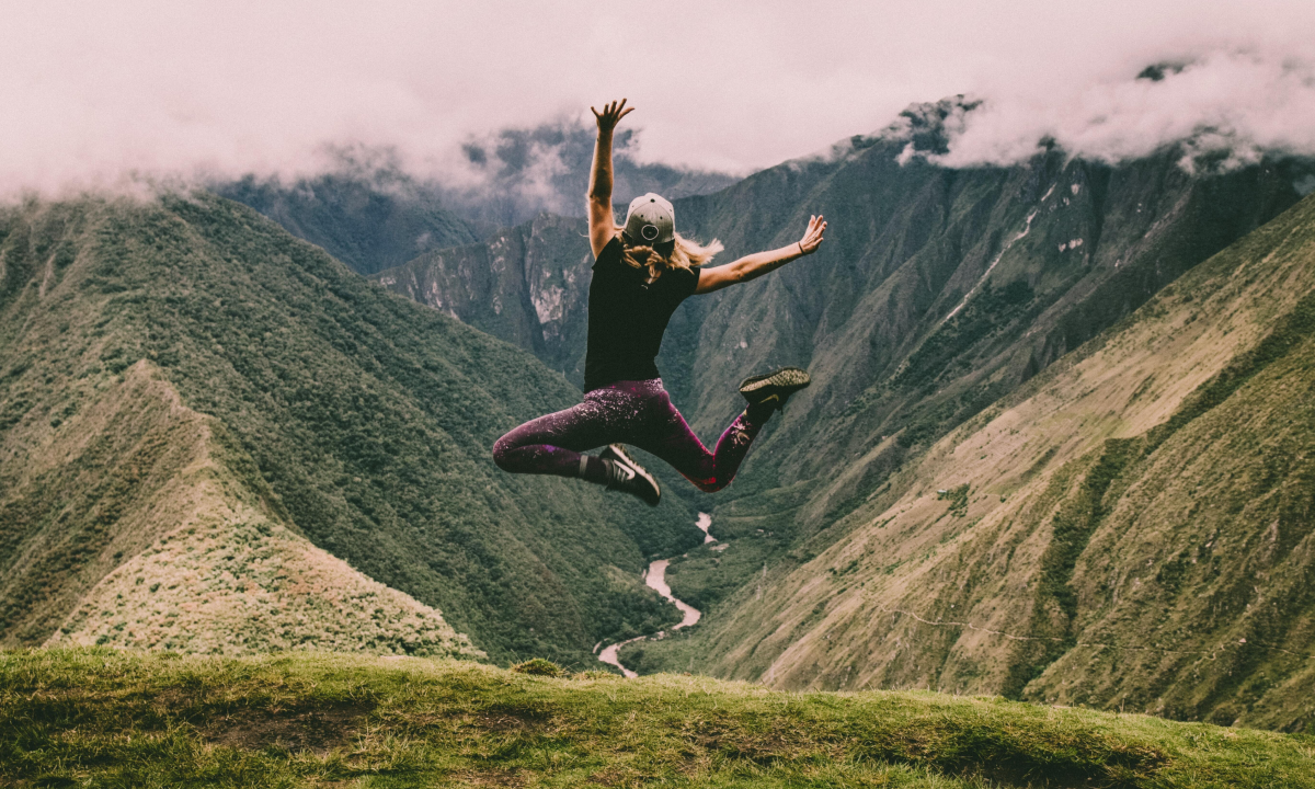 Person jumping joyfully, destress, Self-care