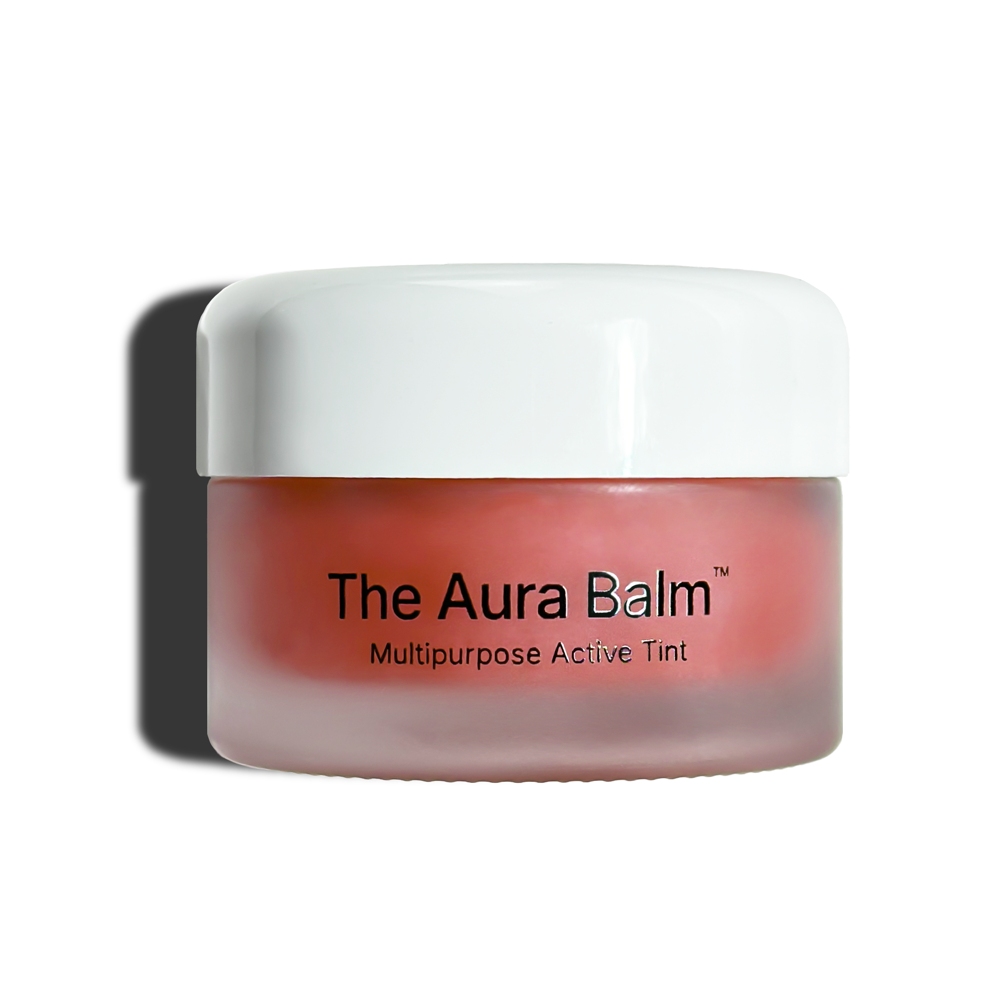 A small jar of 'The Aura Balm' multipurpose active tint with a white lid.