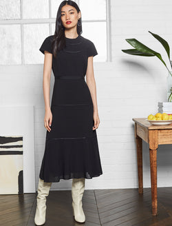 black tiered dress with sleeves