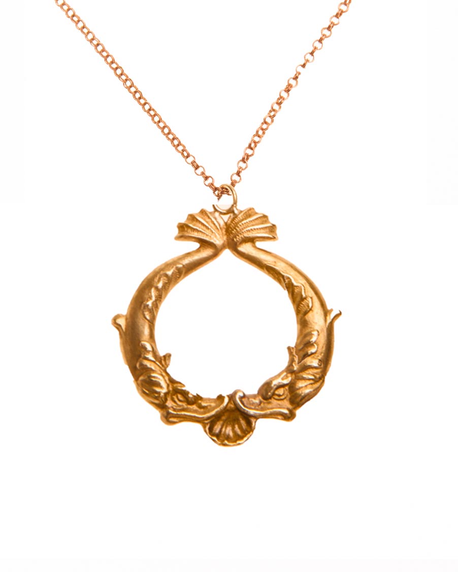 golden necklace with dolphines